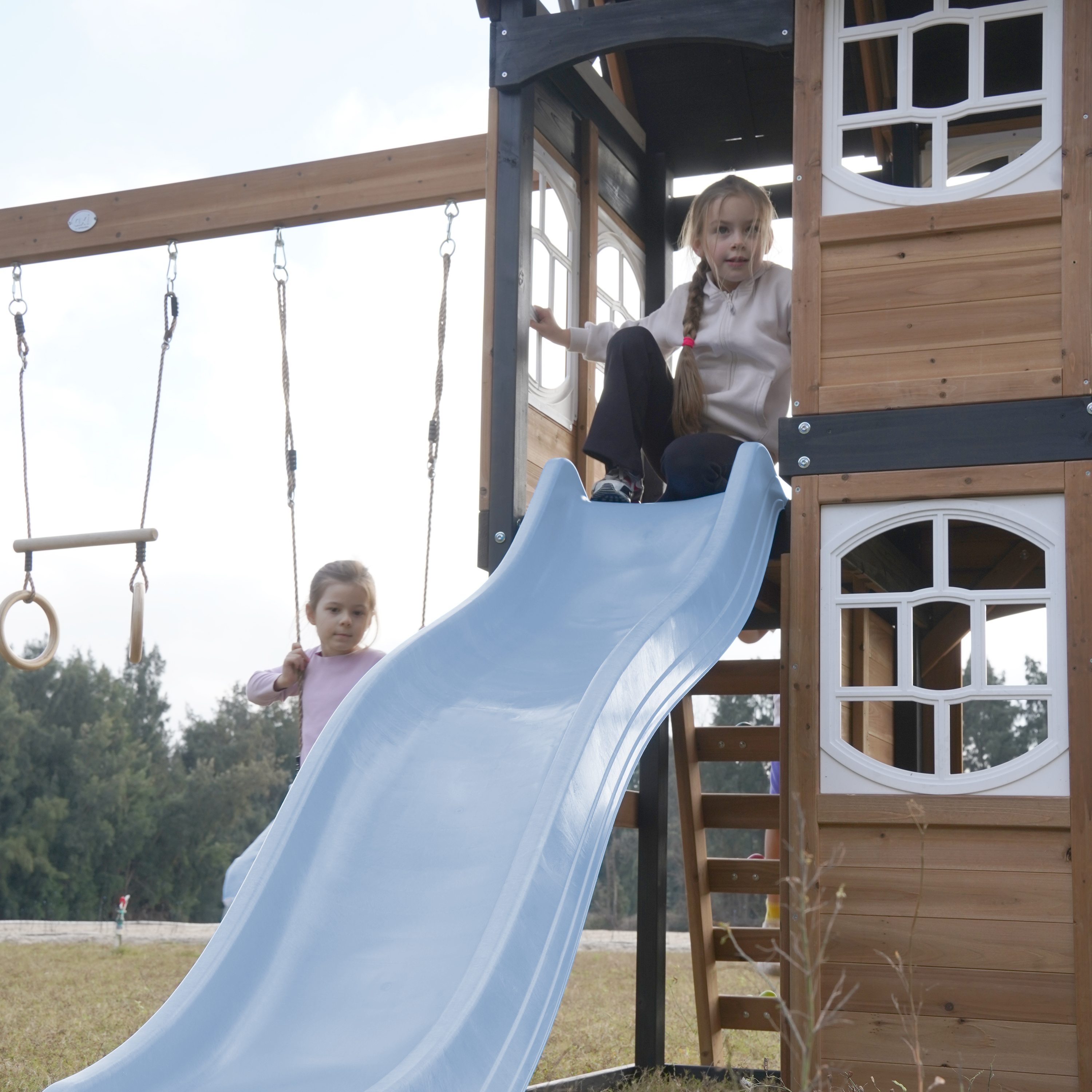AXI Noud Climbing Frame with Playhouse, Swings, Trapeze and Climbing Wall – Pastel Blue Slide and Tube Slide