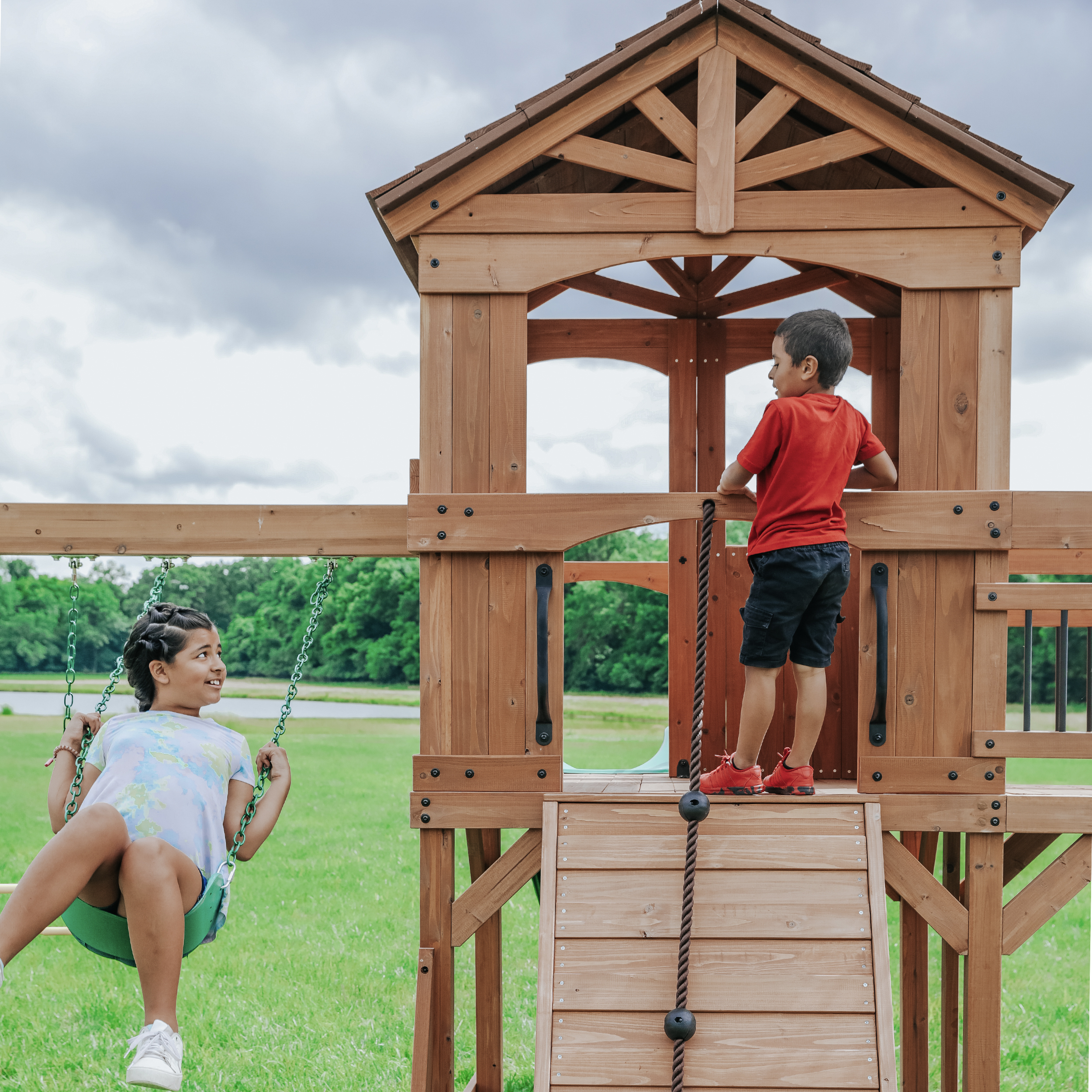 Backyard Discovery Sterling Point Play Set with 3 Swings and Slide - Climbing Wall & Rock Wall - Trapeze - Sandbox - Walkway