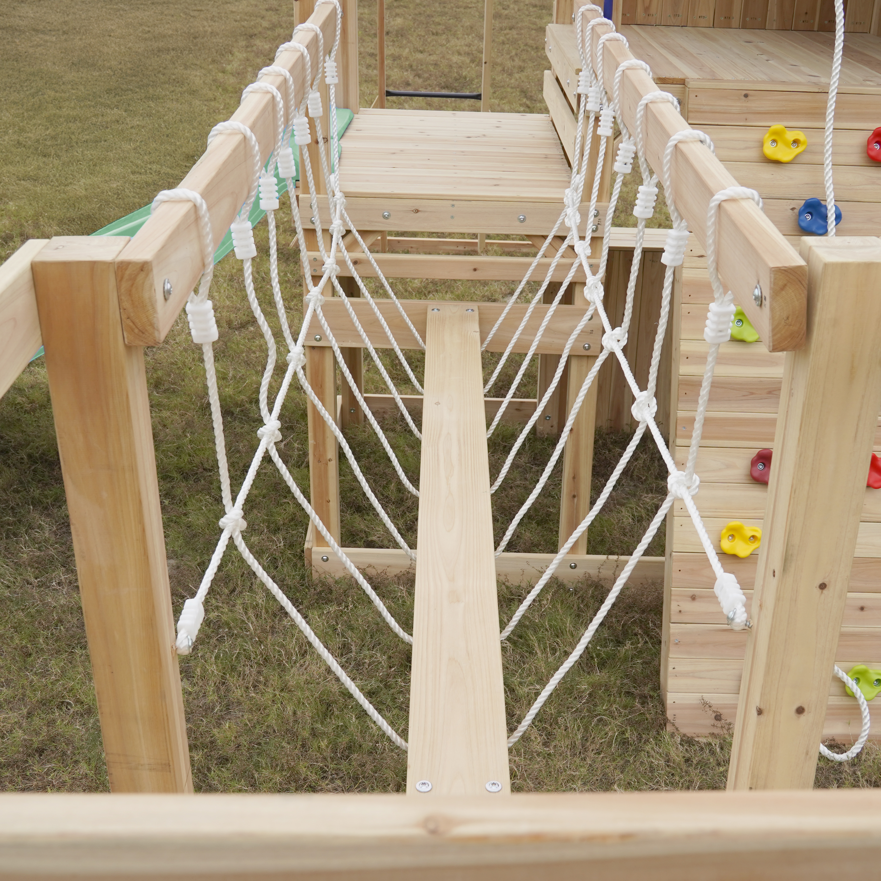 AXI Hunter Climbing Frame with Swings, Climbing Frame, Climbing Bridge and Multiple Platforms – Pastel Green Double Slide