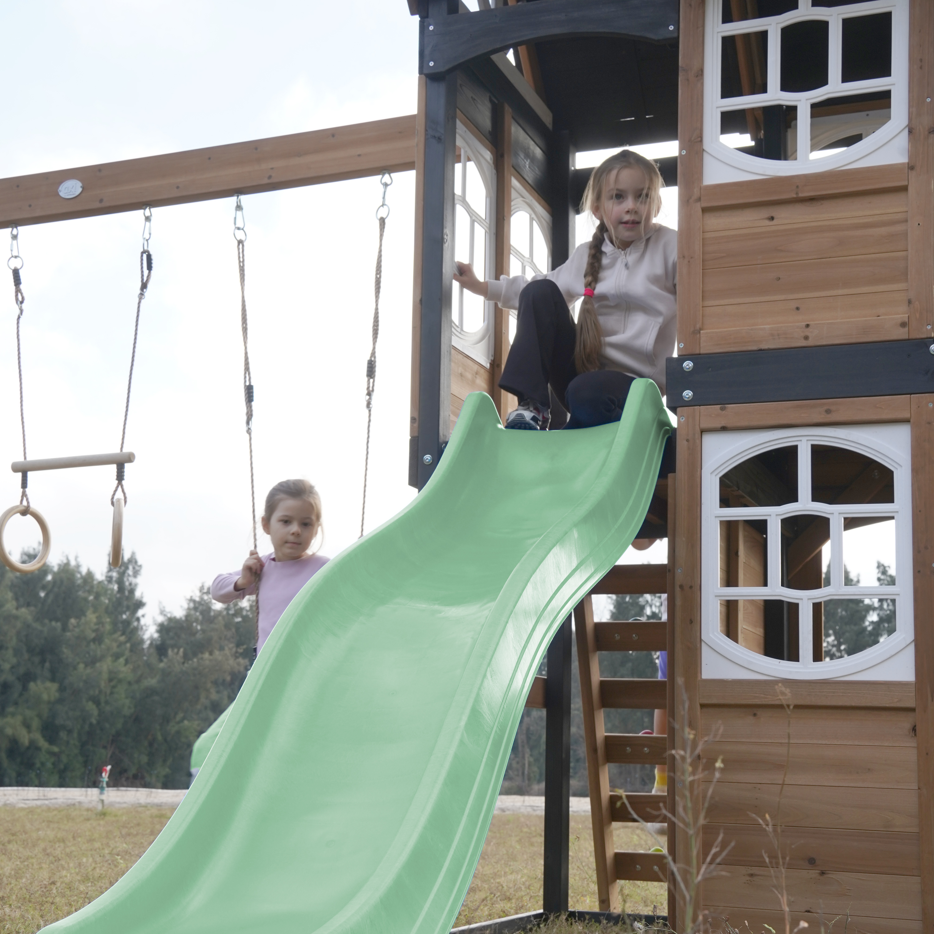 AXI Noud Climbing Frame with Playhouse, Swings, Trapeze and Climbing Wall – Pastel Green Slide and Tube Slide