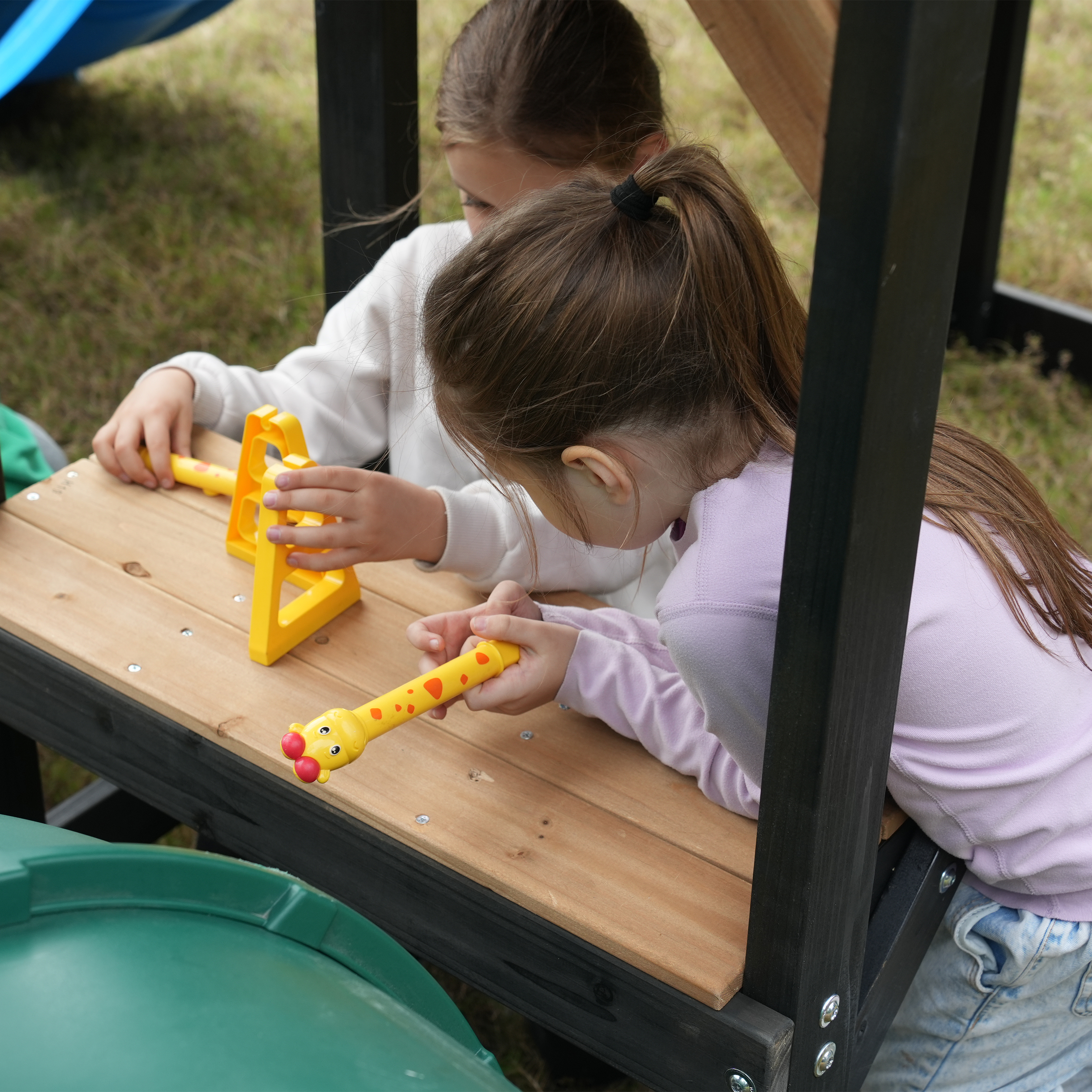 AXI Cody Climbing Frame with Swings, Trapeze and Climbing Wall – Green Double Slide and Tube Slide