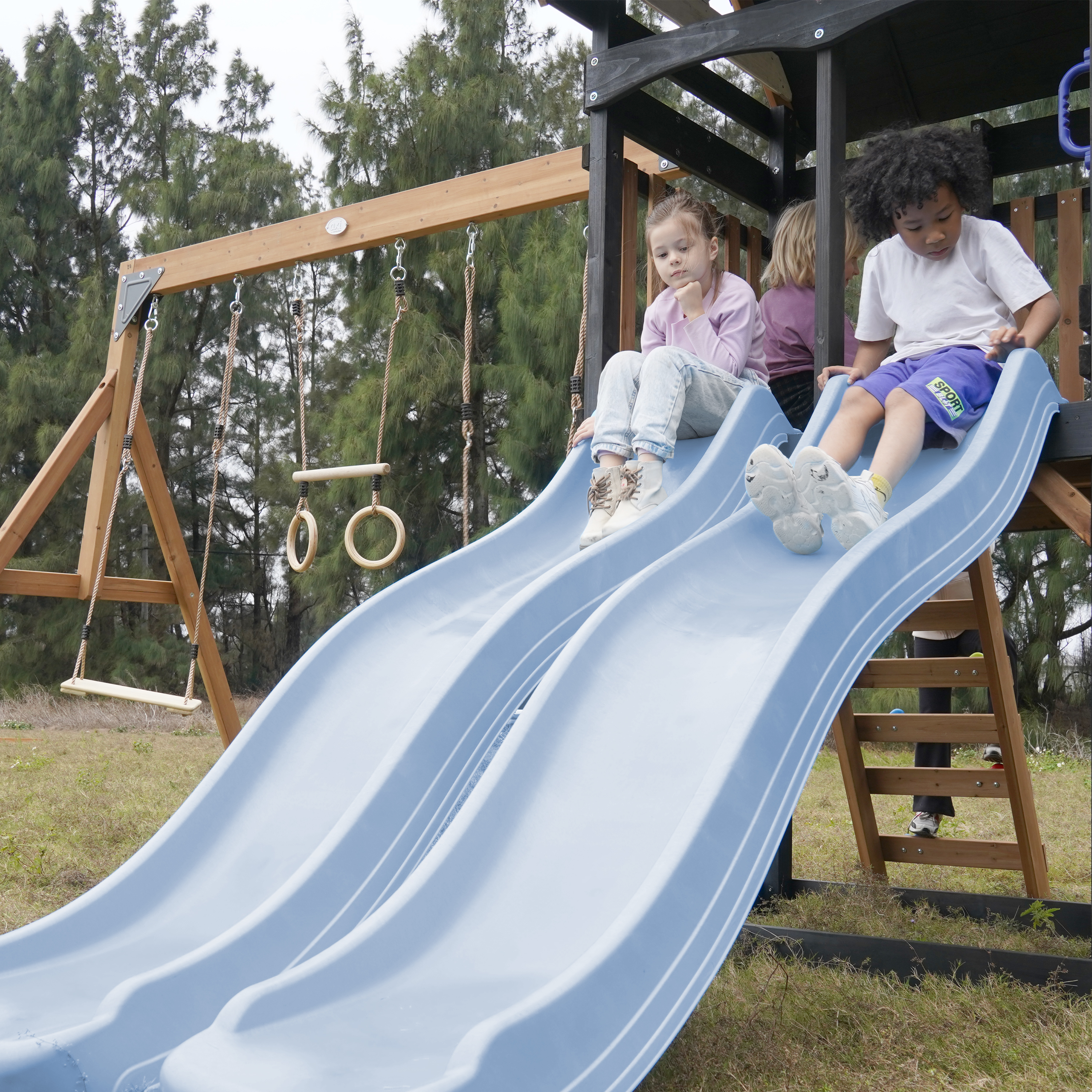 AXI Cody Climbing Frame with Swings. Trapeze and Climbing Wall – Pastel Blue Double Slide and Tube Slide