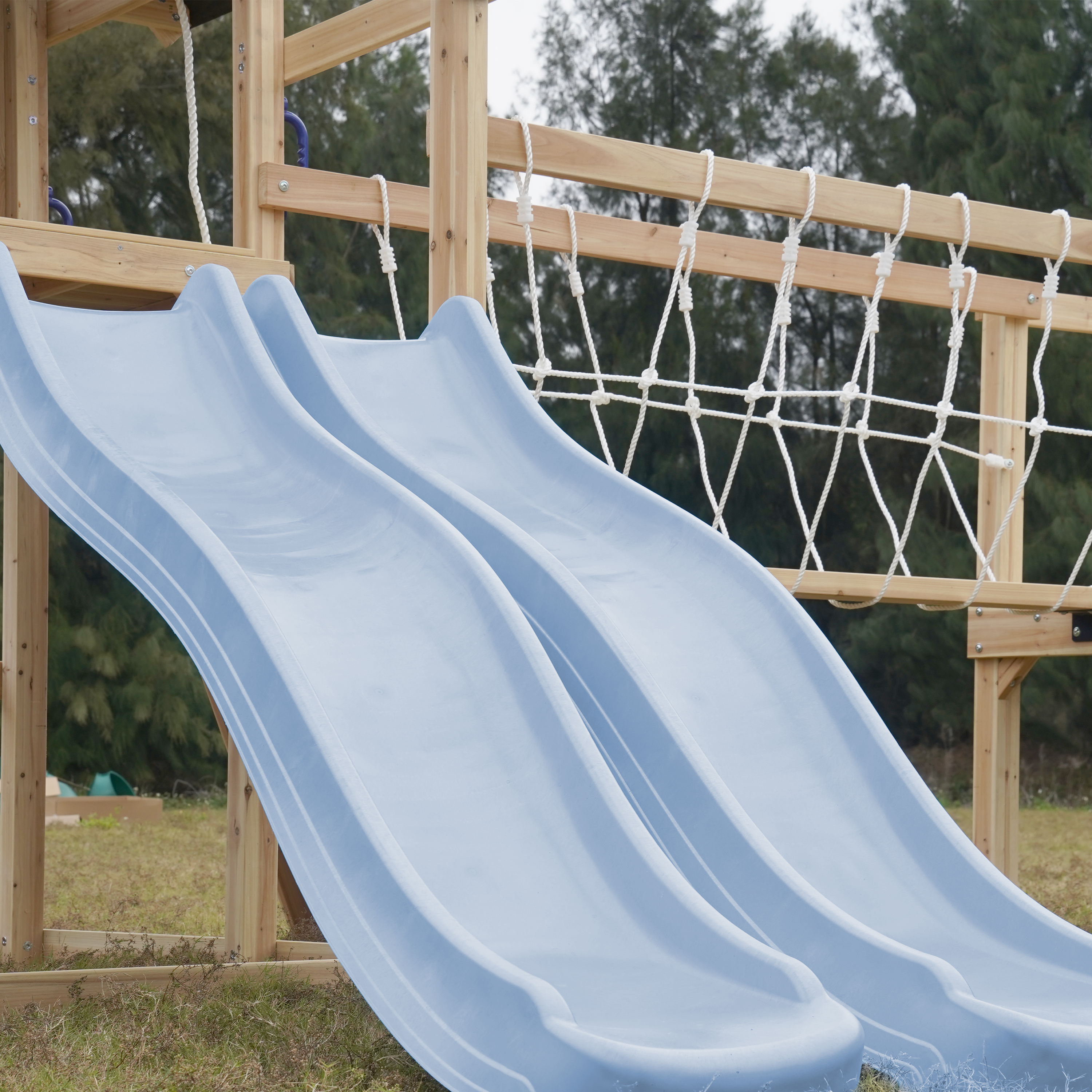 AXI Hunter Climbing Frame with Swings, Climbing Frame, Climbing Bridge and Multiple Platforms – Pastel Blue Double Slide