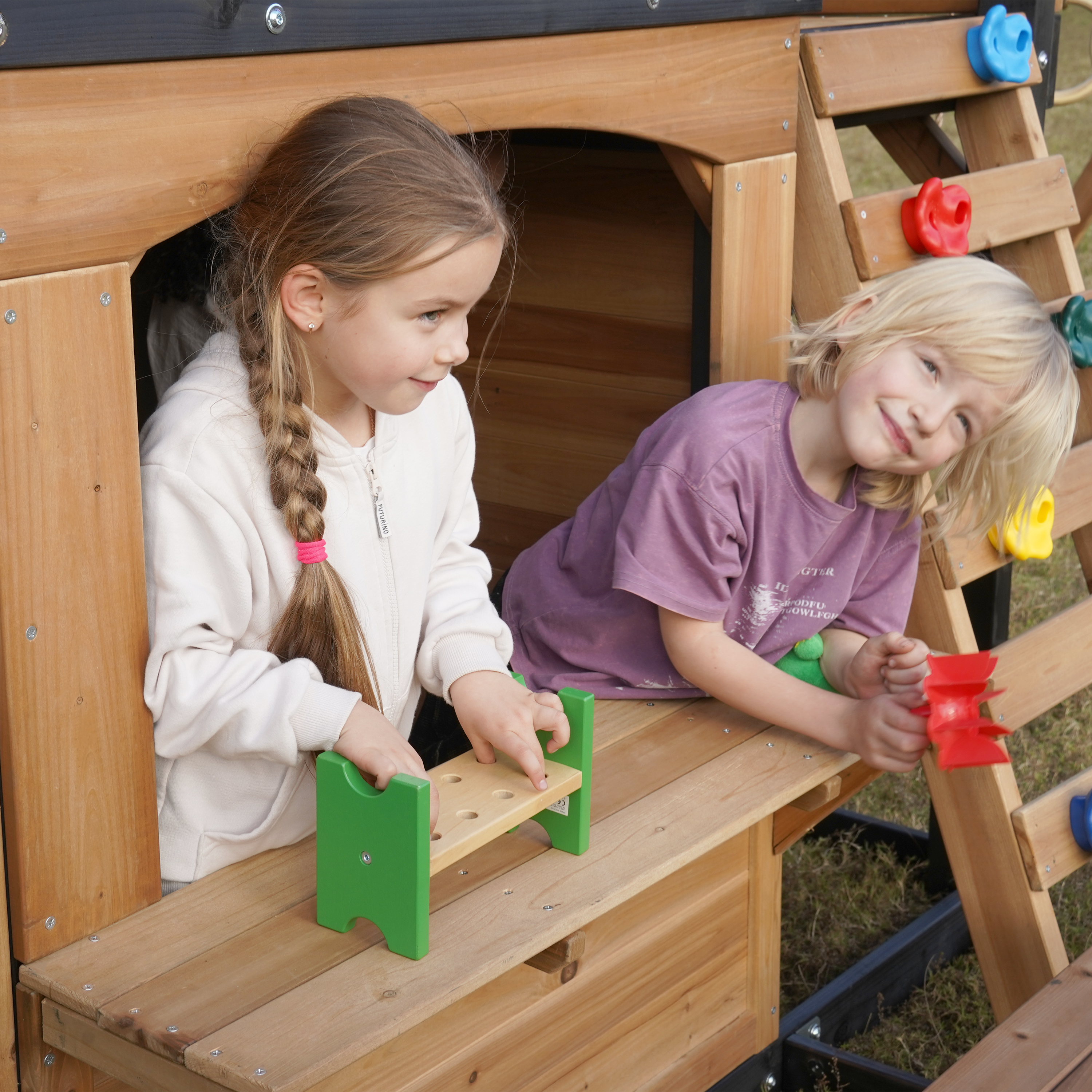 AXI Noud Climbing Frame with Playhouse, Swings, Trapeze and Climbing Wall – Green Slide and Tube Slide