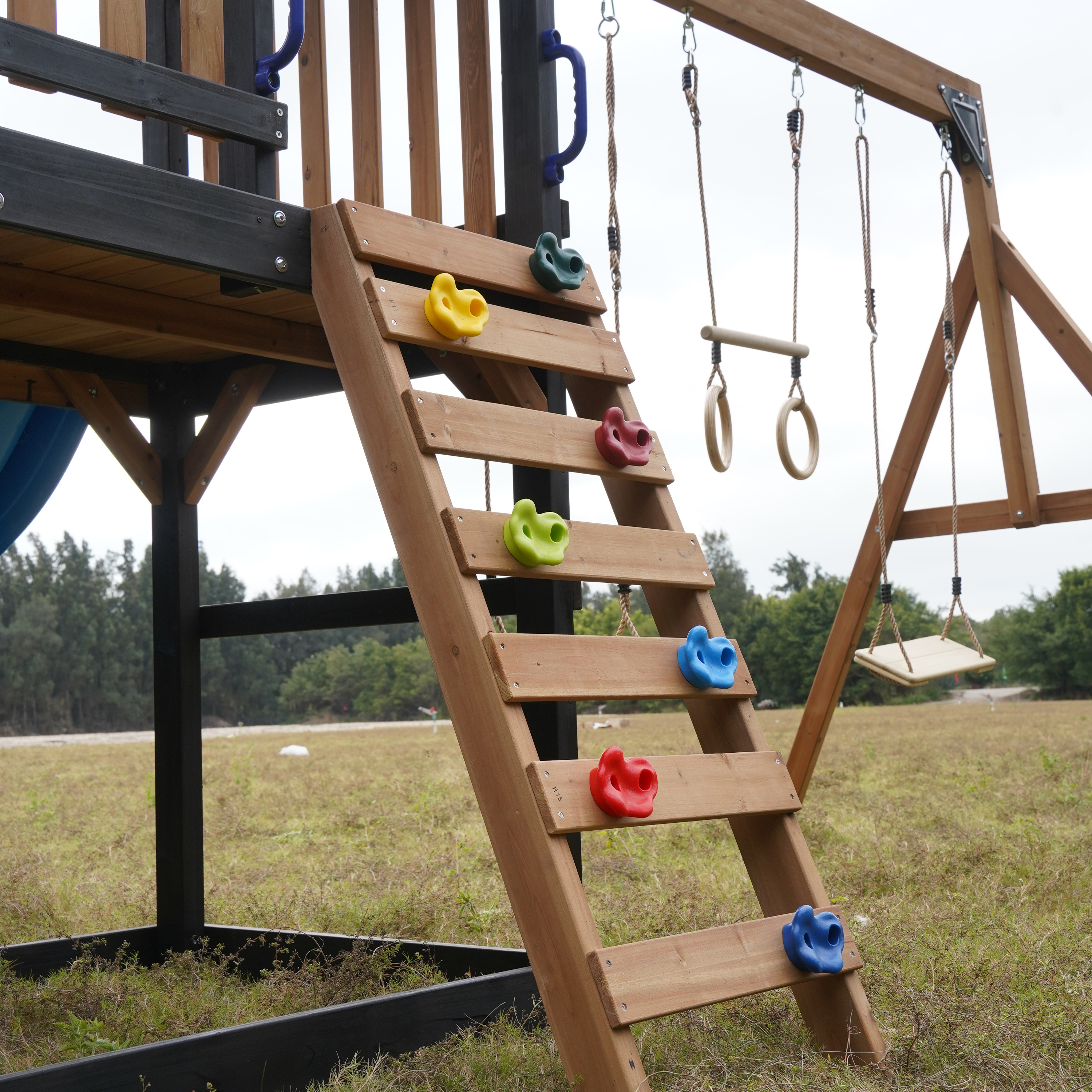 AXI Cody Climbing Frame with Swings. Trapeze and Climbing Wall – Pastel Blue Double Slide and Tube Slide